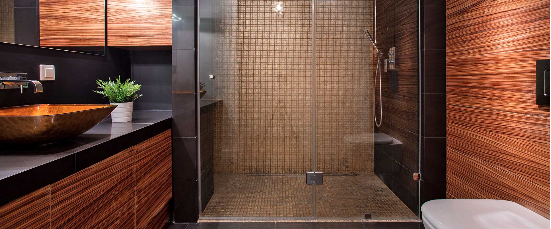 Modern bathroom makeover with oversized and wide shower and ceiling to floor doors